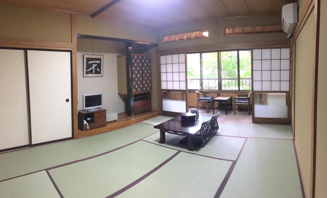 Ele Hotel Onsen Ryokufutei Кусацу Экстерьер фото