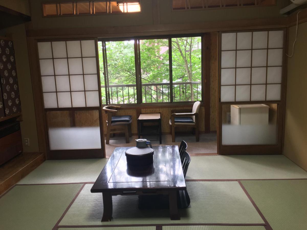 Ele Hotel Onsen Ryokufutei Кусацу Экстерьер фото