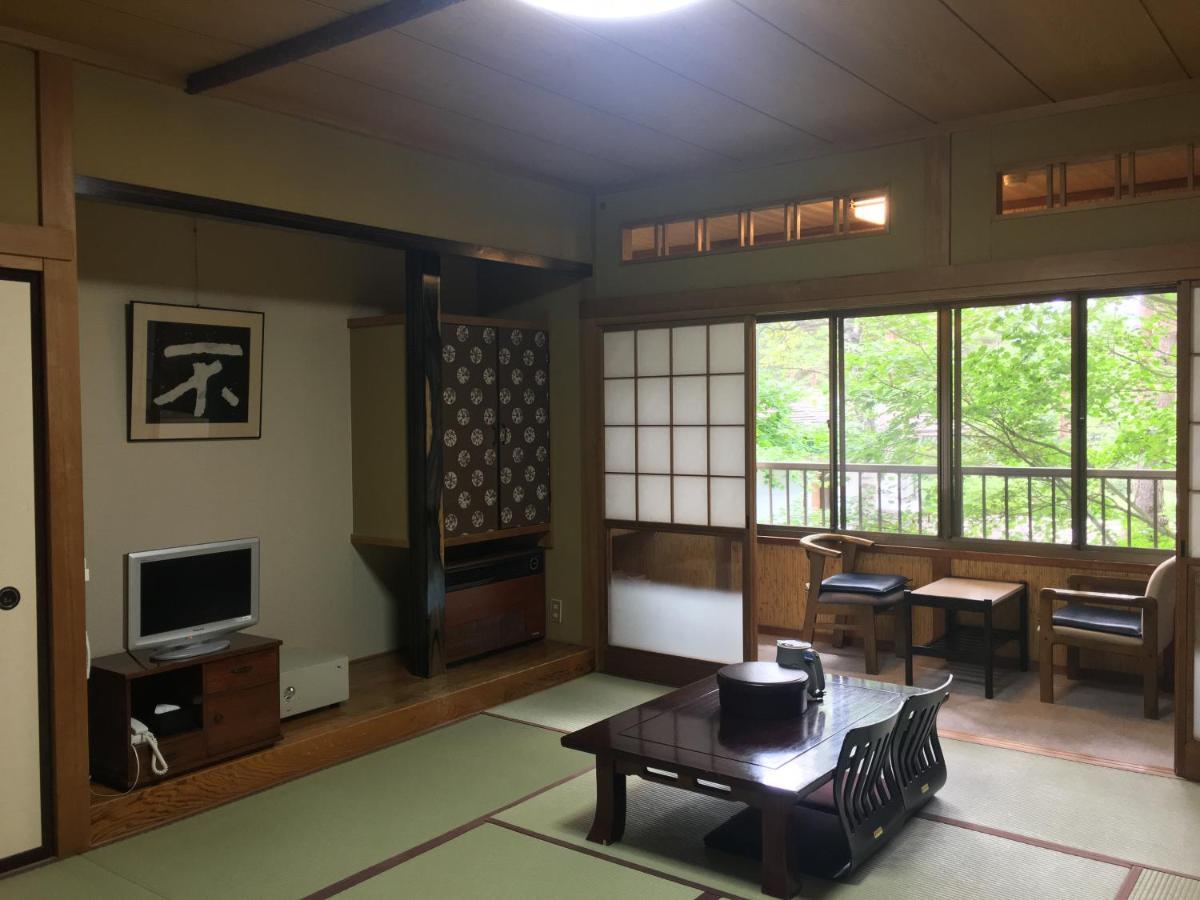 Ele Hotel Onsen Ryokufutei Кусацу Экстерьер фото