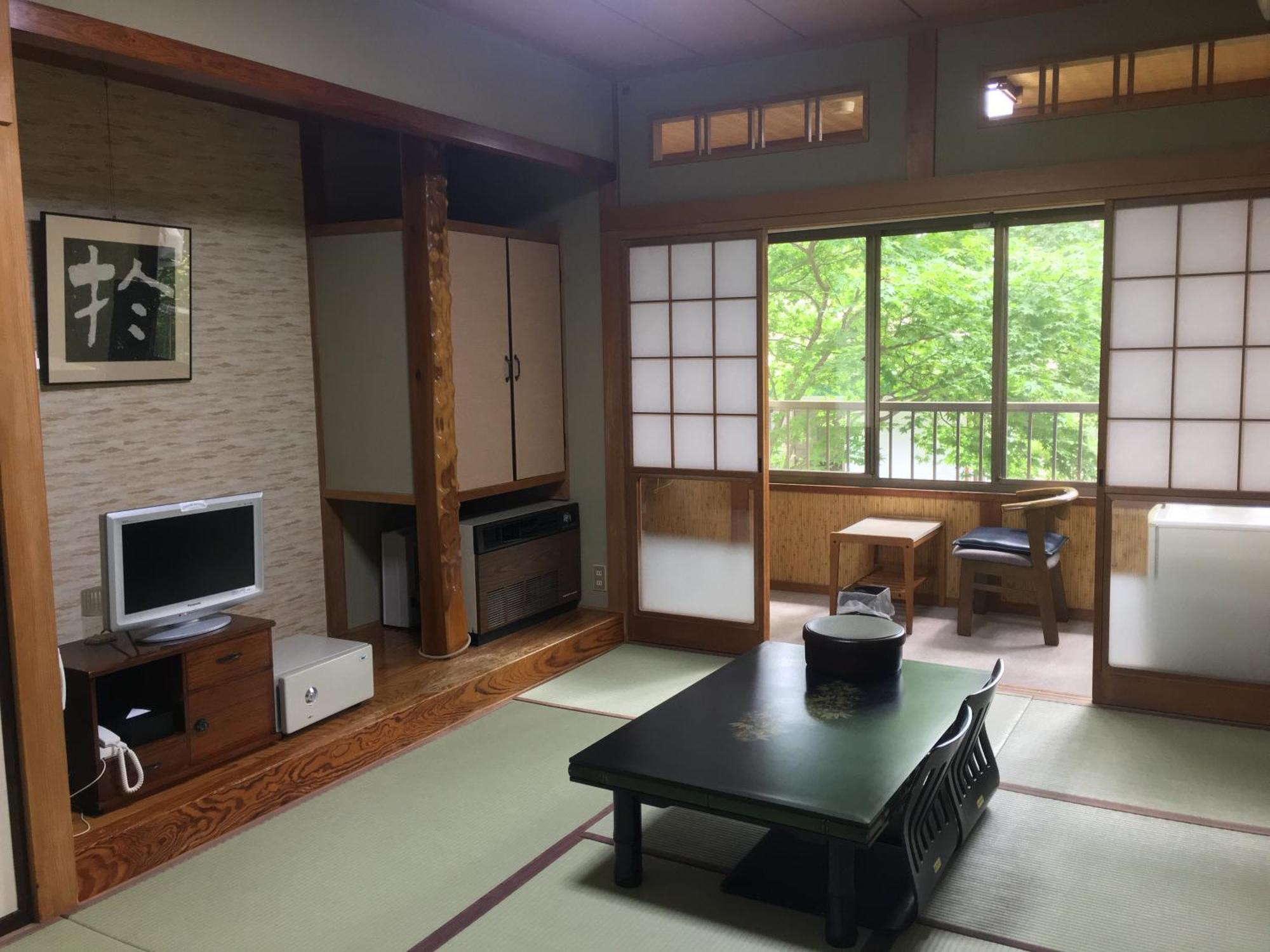 Ele Hotel Onsen Ryokufutei Кусацу Экстерьер фото